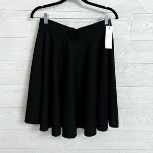 Urban CoCo Women’s Black Polyester Flowy Pull On Skirt. Size L
